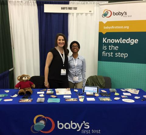 Jaclyn and Bri Greet Visitors at the ACMG Conference