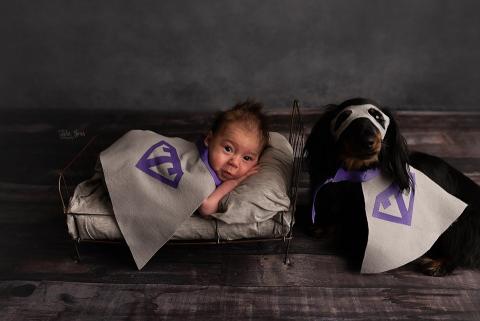 Titus posing with family dog 