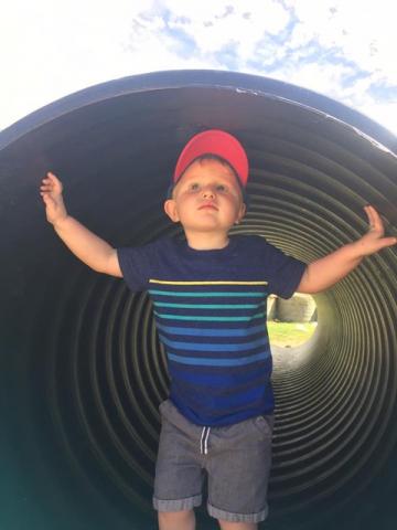 Johnny Bricker playing in a tunnel